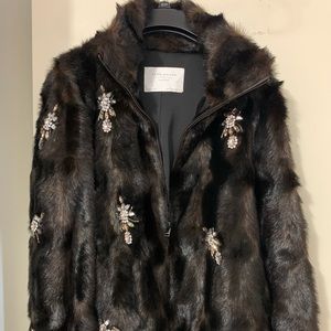 Like new Zara ladies Faux Fur coat with jewel embellishments.